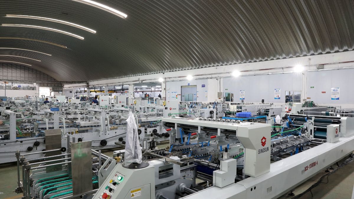 Factory infrastructure showing high ceilings and organized workflow